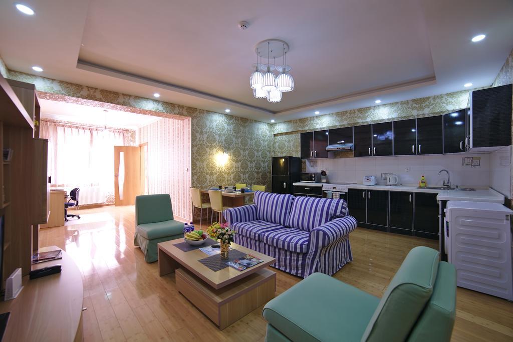 Tanan Center Serviced Apartments Ulán Bator Habitación foto